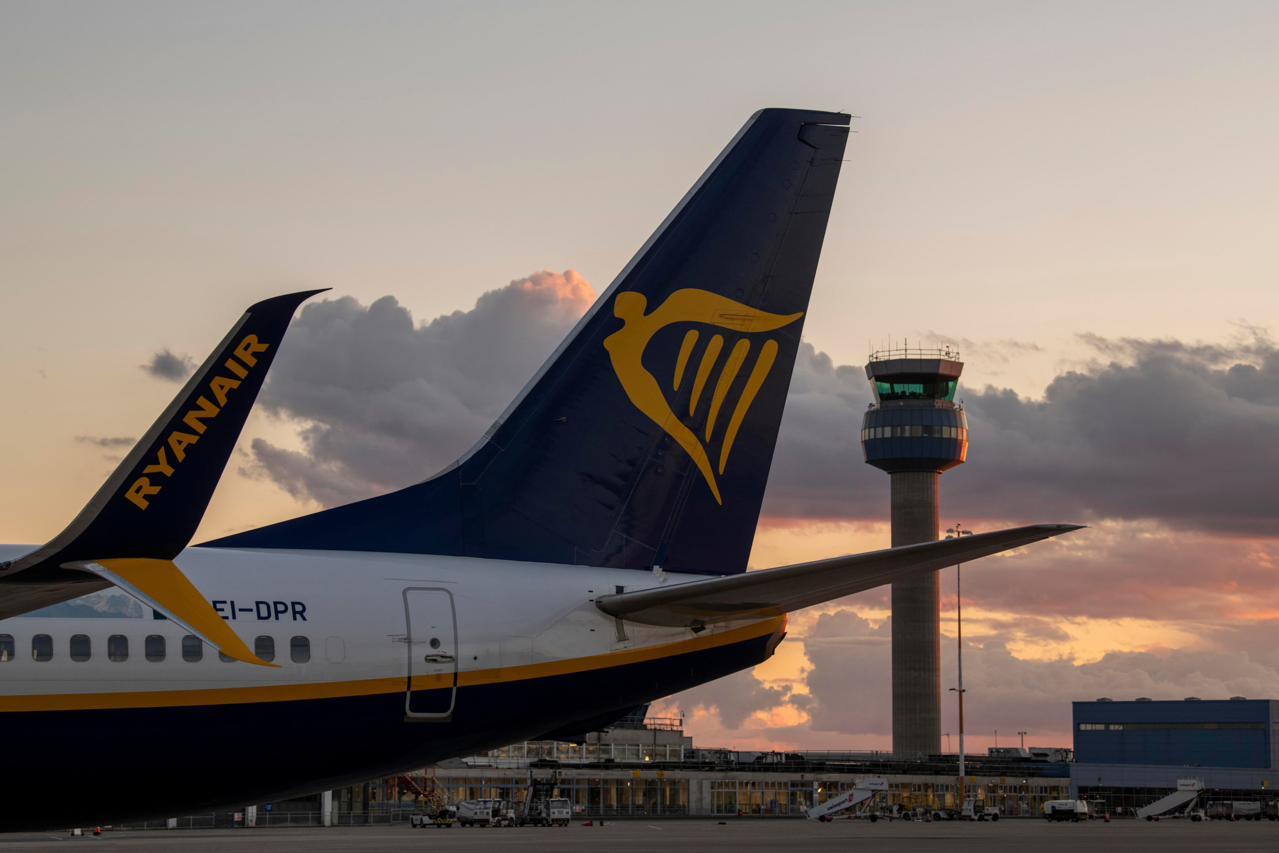 Aircraft and control tower at Manchester Airport